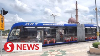 Trackless tram in Putrajaya opens for free public trial