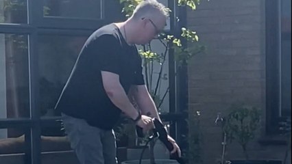 Caring dog 'helps' hooman with a one-man job