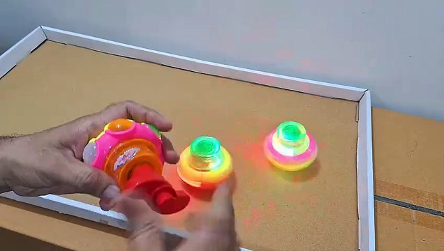 Unboxing and Review of Spinning Top with LED Light, Music and Laser Toy