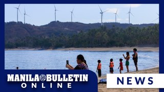 Local tourists spend time relaxing at Pagudpud Beach