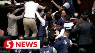 Taiwan lawmakers trade blows in bitter dispute over parliament reforms