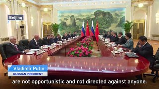 Xi and Putin Pledge To Deepen Strategic Partnership