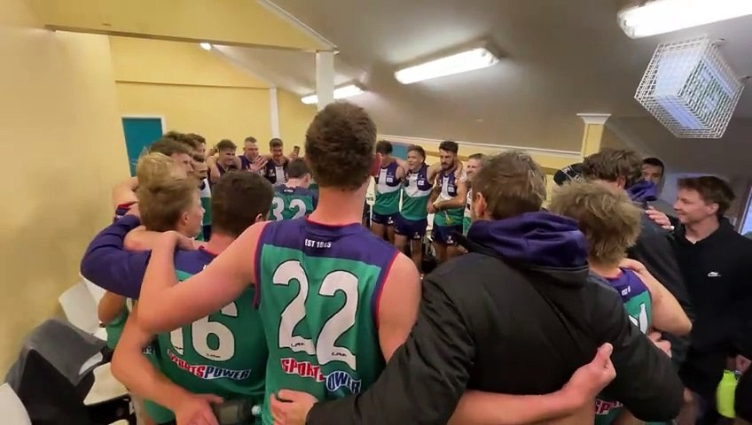 Burnie sing their team song after a close six-point victory against Penguin.