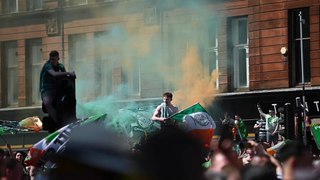 Thousands of Celtic fans gather at Glasgow Cross to celebrate their 54th tile win
