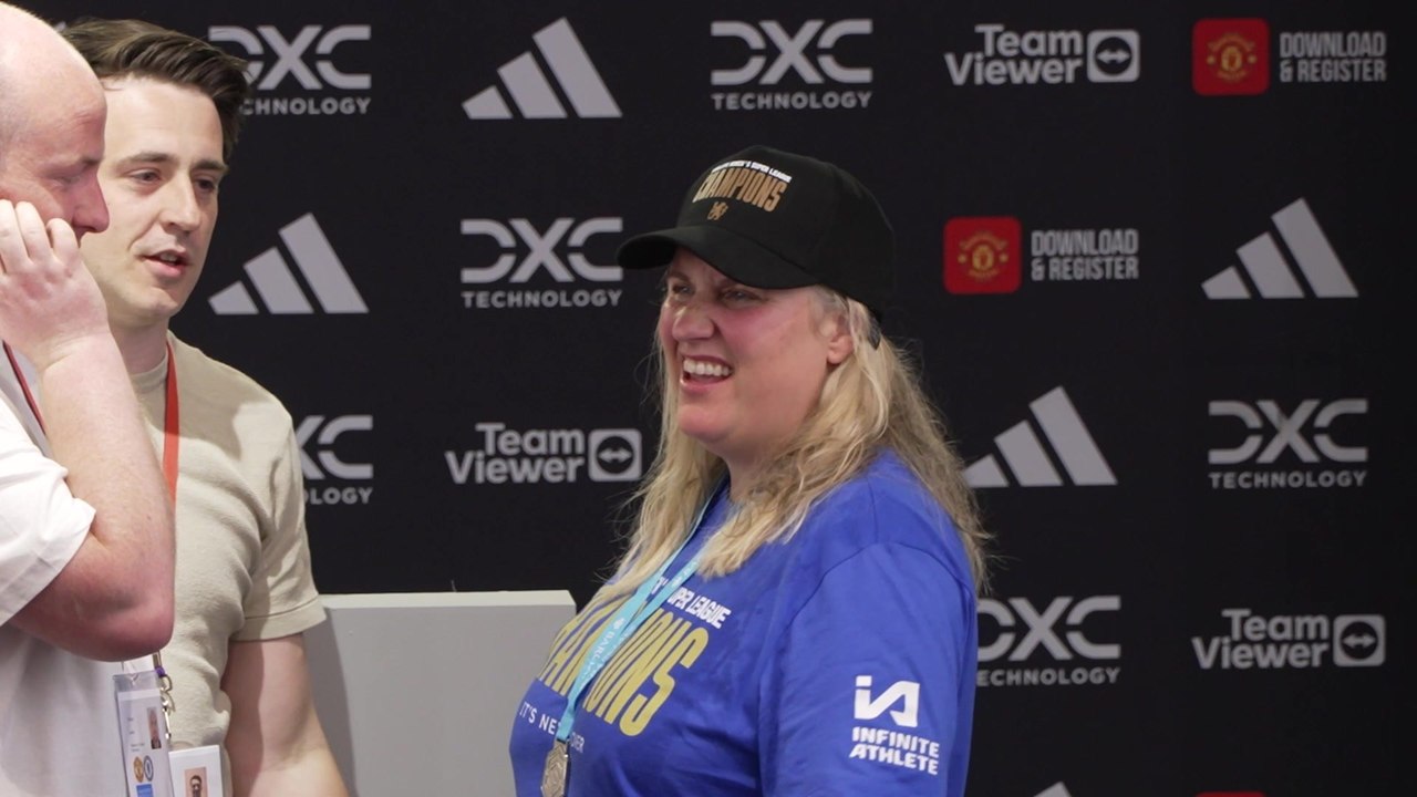 Emma Hayes walk in, chat with media and walk out shots
