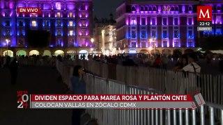 Autoridades capitalinas instalan vallas para separar la 'Marea Rosa' del plantón de la CNTE