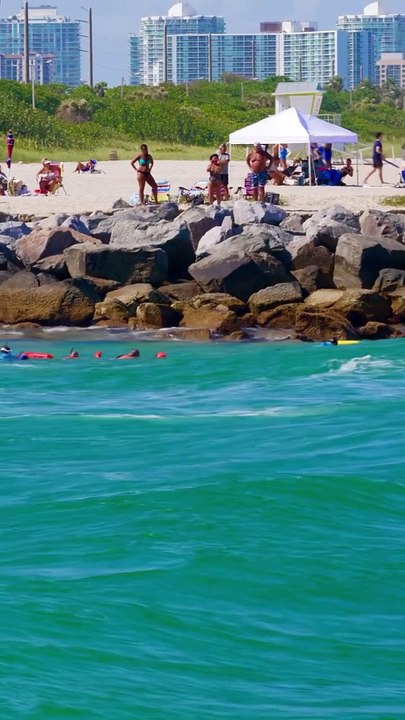 New recruits at Miami Dade Fire Rescue Ocean Division practicing inside of the notorious Haulover Inlet and beach in Miami Florida