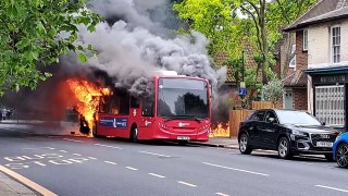 Fire rages through bus as 30 firefighters tackle blaze