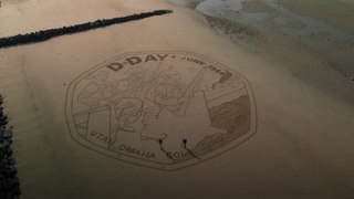 Artists recreate 50p D-Day coin on Normandy beach where troops landed