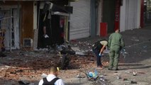 Dos policías muertos y 50 millones de pesos robados