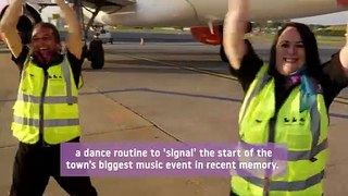 Watch as Luton airport staff welcome Radio 1 Big Weekend with dance