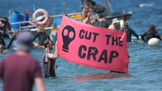 WATCH: Protestors 'paddle-out' for Pembrokeshire people’s rights to clean water
