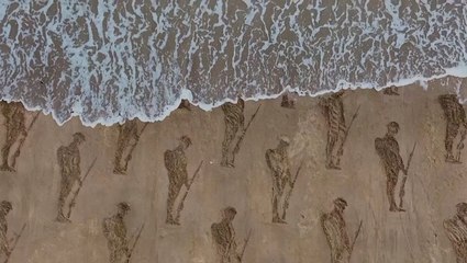 Sand silhouettes on UK beach mark 80th anniversary of D-Day landings