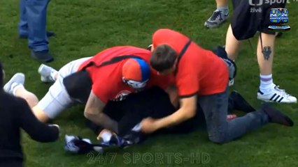 Major European Cup Final Descends into Chaos with Players Rushed to Safety as Fans Storm the Pitch