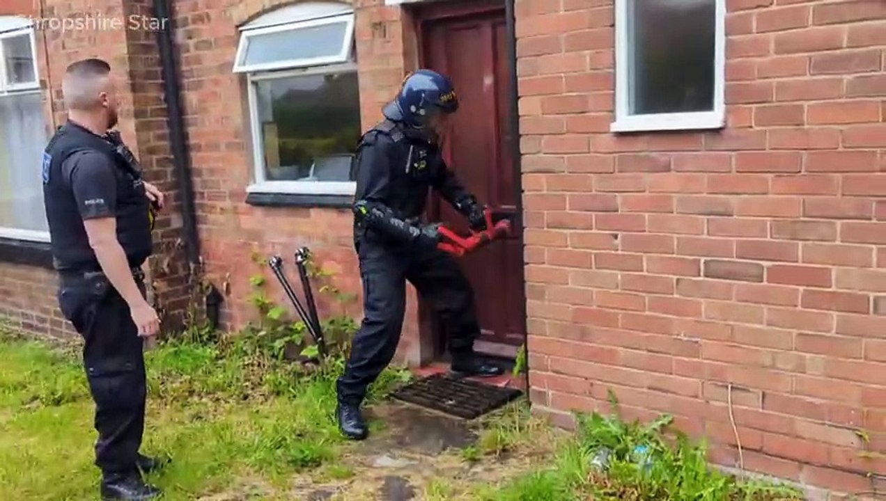 Man arrested after early morning police raid on Telford home - video ...