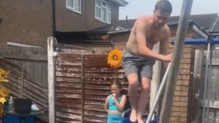 Uncle's wipeout: Soapy slide turns uncle into a human sled