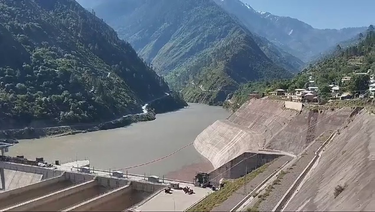 "A View of Sustainability: Nellum Jhelum Hydro Electric Dam"   "Clean Energy in Action: Nellum Jhelum Hydro Electric Project"