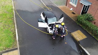 Firefighters tackle car blaze in Peterborough