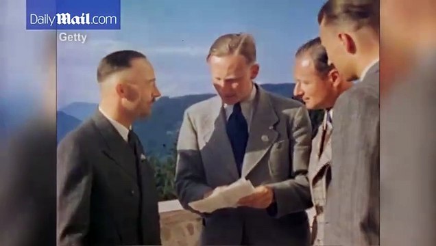 Reinhard Heydrich chats to Himmler at Hitler's estate in 1940