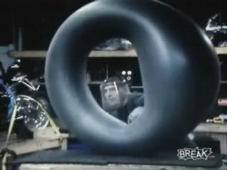 Tire Explodes In Guys Face