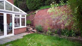 Garden wall which crashed into home could cost £30k to fix