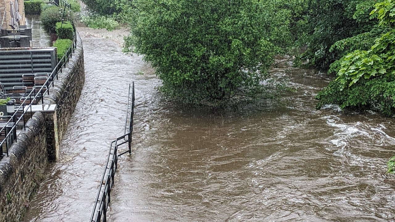 Heavy rain sees flooding along the Water of Leith in Edinburgh - video ...