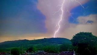 Dramatic moment lightning struck a mountain in Wales