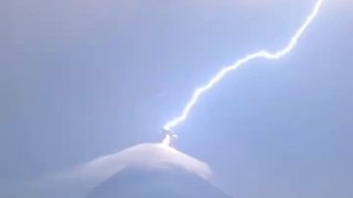 Footage Captures Lightning Above Erupting Volcano