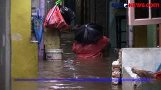 Judul: Hujan Deras, Ratusan Rumah di Kebon Pala Terendam Banjir Hampir Satu Meter