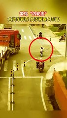 Close Call,Woman Almost Hit by Truck