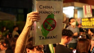 Tens of thousands protest Taiwan parliament bills