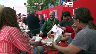 Paris' Champs-Élysées transformed into gigantic picnic