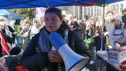 Protesters vote to stay at a pro-Palestine encampment