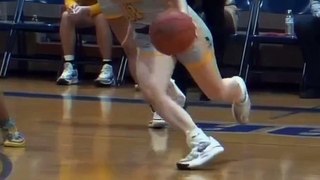 Beautiful Girl playing basketball 