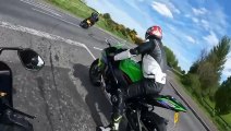 Motorcyclist drives very fast on an unknown road