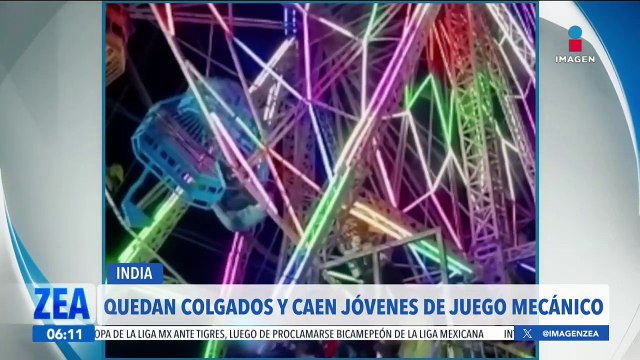 Jóvenes quedan colgados de cabeza en una rueda de la fortuna en India