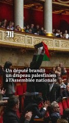 Un député brandit un drapeau national palestinien à l’Assemblée nationale 