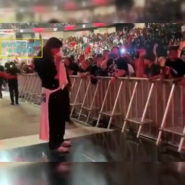 Dominik mysterio wipes Liv Morgan lips off with a towel after WWE RAW went off air