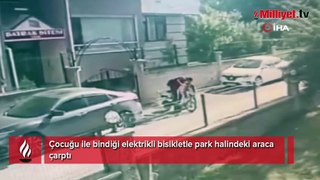 Çocuğu ile bindiği elektrikli bisikletle park halindeki araca çarptı
