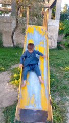 Cute Boy Playing in the Park