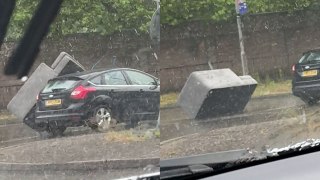 Dopey driver tries (and fails) to carry sofa on top of car