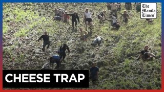 Cheese chasers run downhill in annual British race