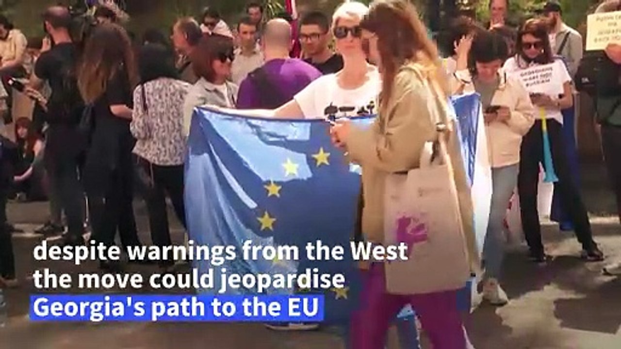 Thousands protest as Georgian parliament adopts 'foreign influence' law