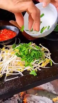 Chinese burger Stir-fried mung bean sprouts on stone slab