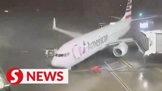 Parked plane blown off position at Texas airport, severe storms continue to batter US