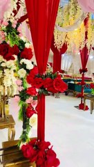 Banquets baraat events entrance decor bridal stage red rose flower work.