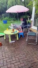 A south African making a braai in terrible weather