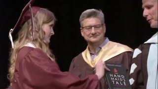 Watch: High school student’s defiant protest of book ban during graduation ceremony