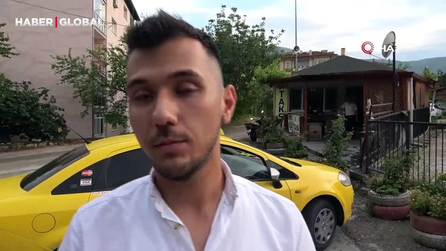 Amasya'da sele kapılan kadın, taksici tarafından son anda böyle kurtarıldı