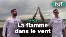 Au Mont-Saint-Michel, Thomas Pesquet récupère la flamme olympique en plein vent